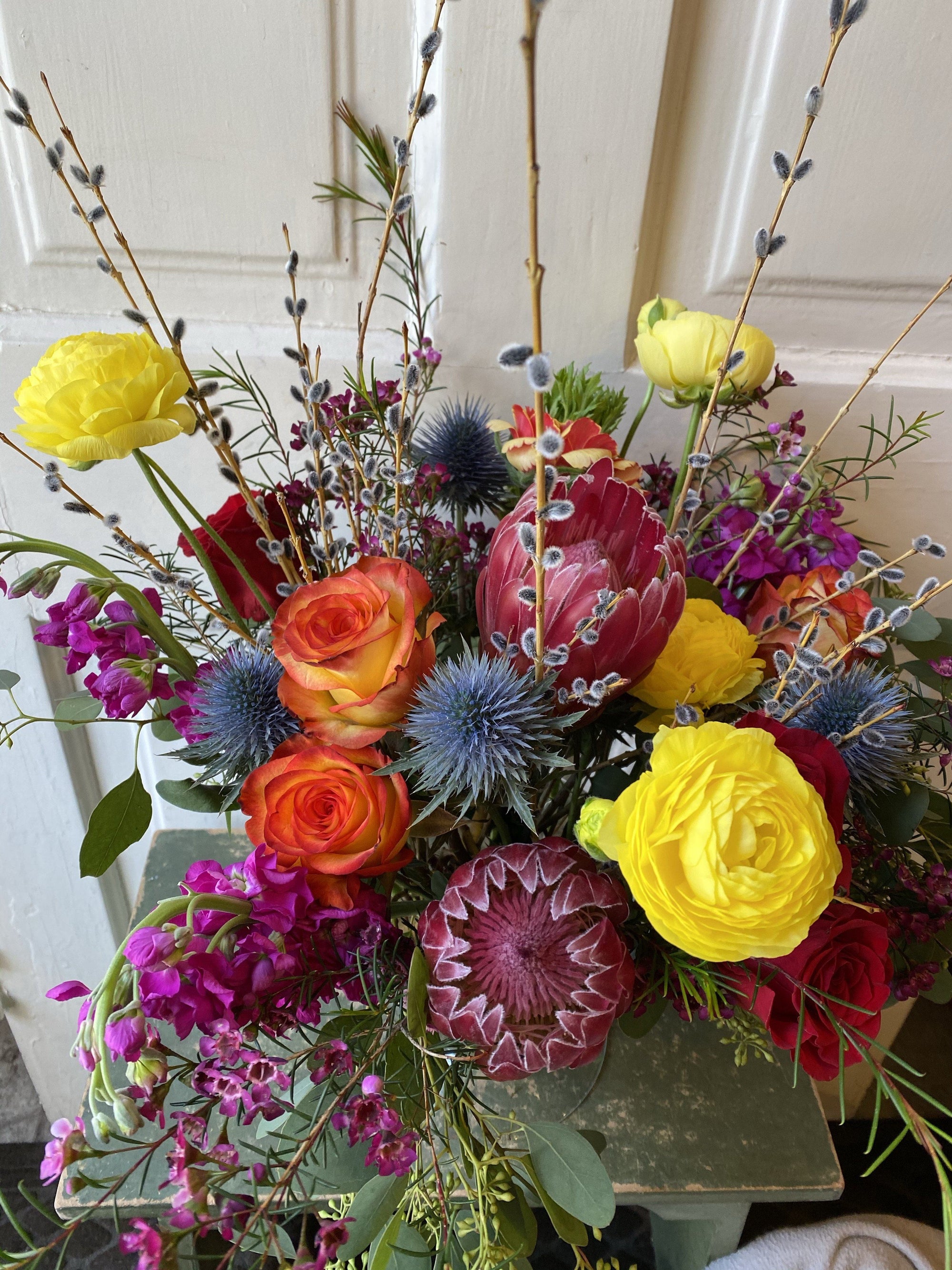 custom designed flower arrangement: $45 - $200