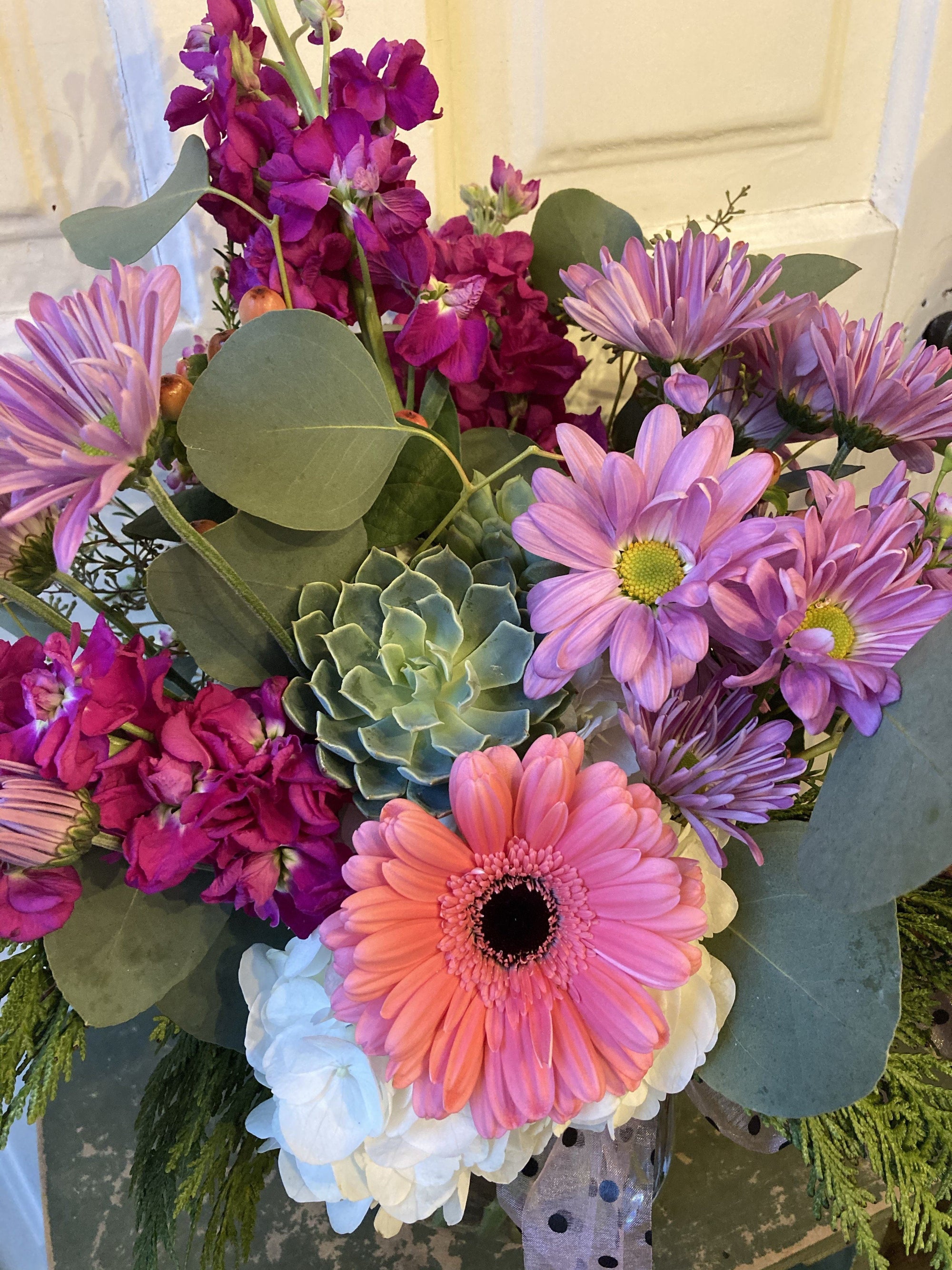custom flower arrangement: $45 - $200